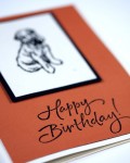 A happy birthday card featuring a dog design.